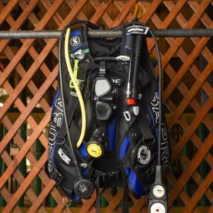BCD's for diving hanging in the shop at Sun Divers in Roatan, Honduras.